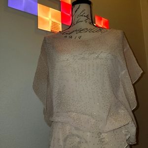 White sparkly blouse